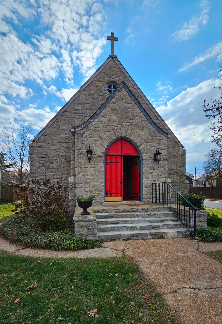 Stone church with red doors